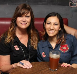 Denise Ratfield and Mexican brewer Laura Estela Garcia drinking Chicali Unite Red Ale  from  Cerveceria Tres B in Mexicali, Mexico.  (Photo by Diego Castillón. of La Cronica newspaper In Mexicali)