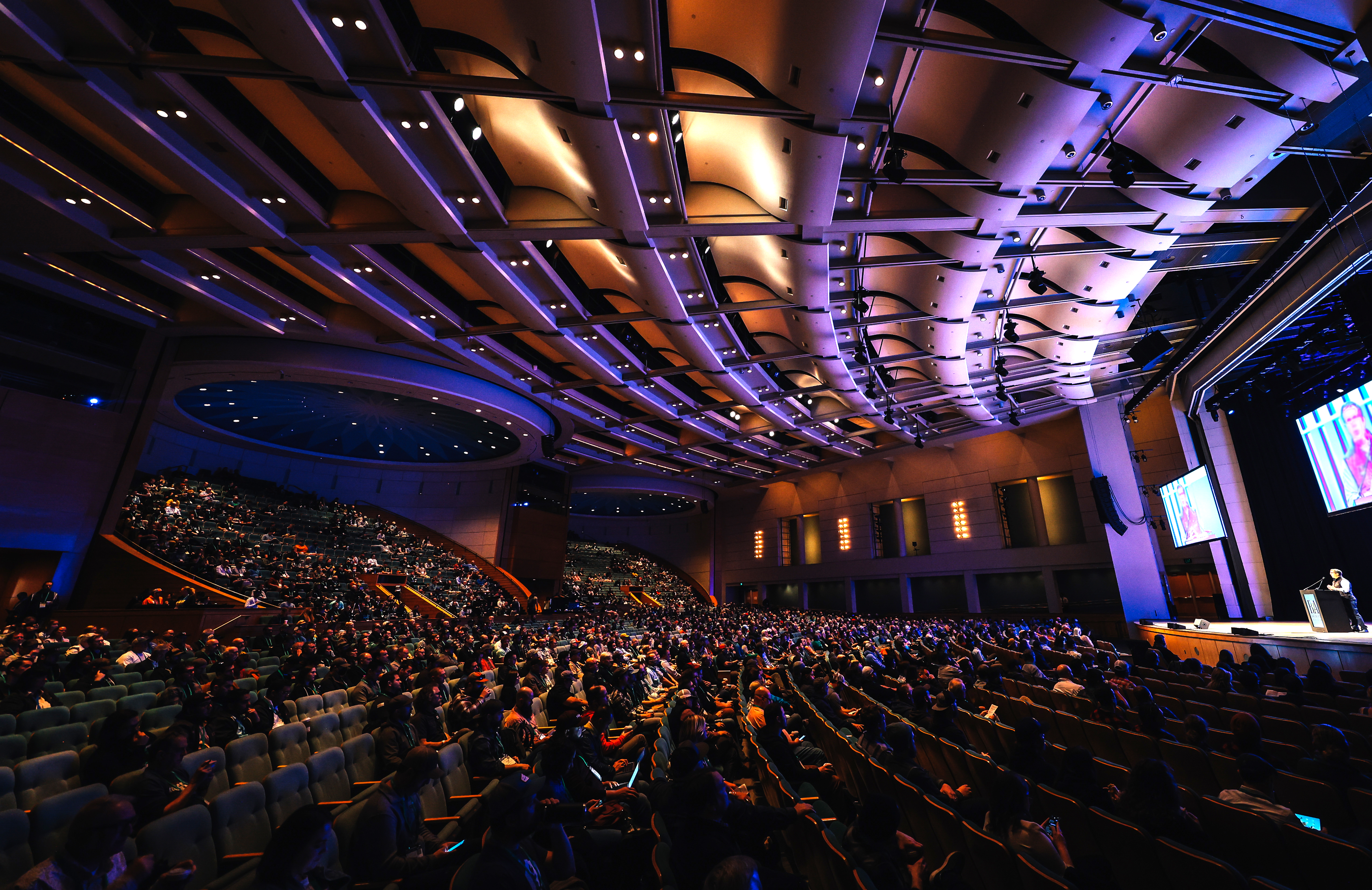 [ photo of CBC audience in large hall ]