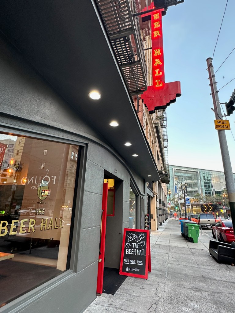 The Beer Hall, sidwalk sign and building signage for a second location near Powell BART.